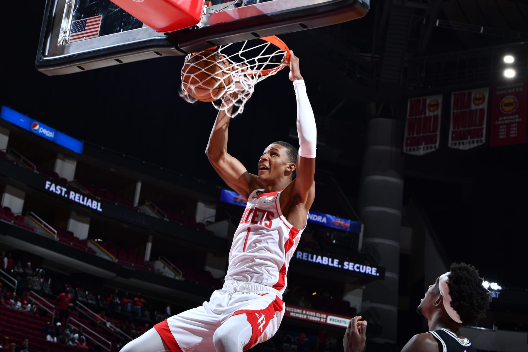 HOUSTON, TX - OCTOBER 2: Jabari Smith Jr. #1 of the Houston Rockets dunks the ball during a preseason game against the San Antonio Spurs on October 2, 2022 at the Toyota Center in Houston, Texas. NOTE TO USER: User expressly acknowledges and agrees that, by downloading and or using this photograph, User is consenting to the terms and conditions of the Getty Images License Agreement. Mandatory Copyright Notice: Copyright 2022 NBAE (Photo by Logan Riely/NBAE via Getty Images)