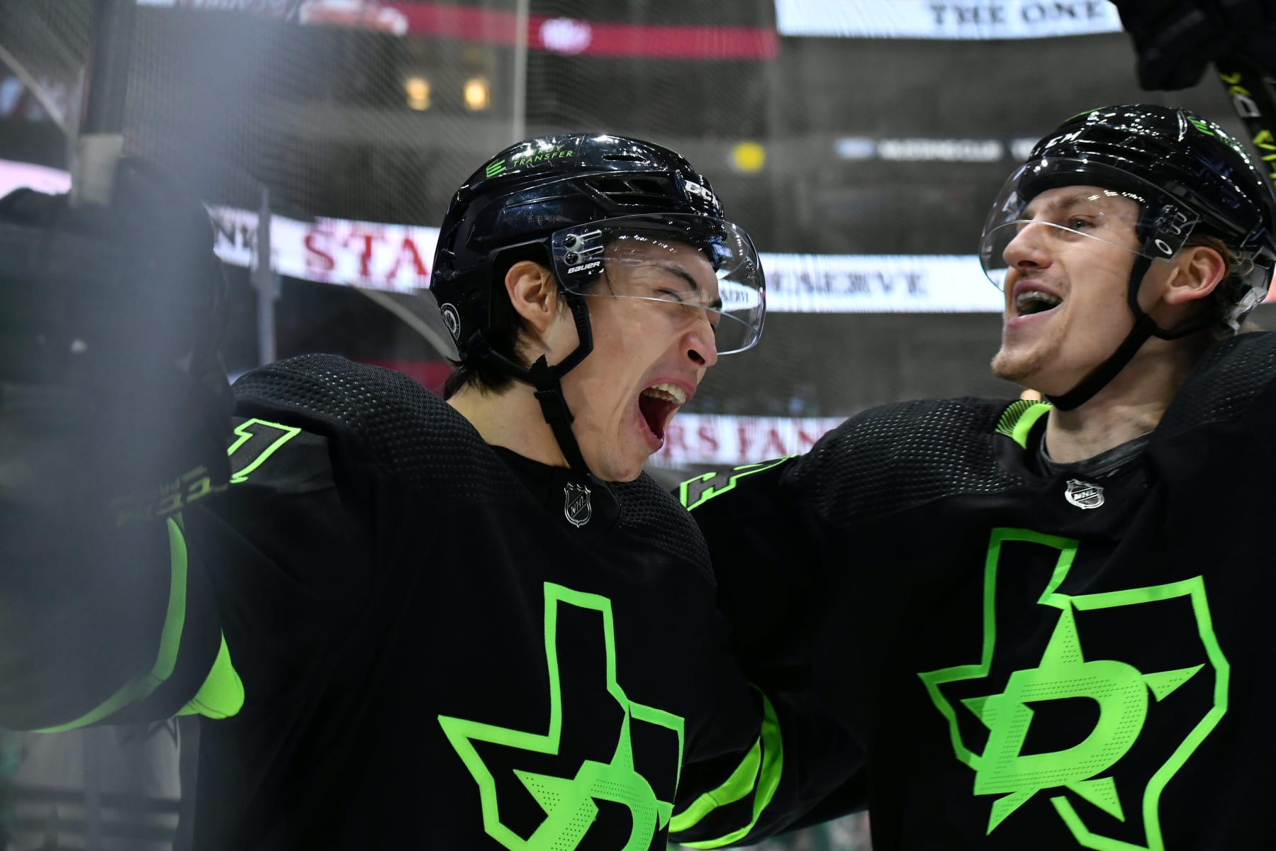 DALLAS, TX - DECEMBER 2: Jason Robertson #21 and Roope Hintz #24 of the Dallas Stars celebrate a goal against the Columbus Blue Jackets at the American Airlines Center on December 2, 2021 in Dallas, Texas. (Photo by Glenn James/NHLI via Getty Images)