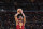 CHICAGO, IL - APRIL 15: Evan Mobley #4 of the Cleveland Cavaliers shoots a free throw during the game against the Atlanta Hawks during the 2022 Play-In Tournament on April 15, 2022 at Rocket Mortgage Fieldhouse in Cleveland, Ohio. NOTE TO USER: User expressly acknowledges and agrees that, by downloading and or using this photograph, User is consenting to the terms and conditions of the Getty Images License Agreement. Mandatory Copyright Notice: Copyright 2022 NBAE (Photo by Jeff Haynes/NBAE via Getty Images)