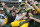 GREEN BAY, WISCONSIN - OCTOBER 02: Fans celebrate with Romeo Doubs #87 of the Green Bay Packers after his touchdown 
during the fourth quarter against the New England Patriots at Lambeau Field on October 02, 2022 in Green Bay, Wisconsin. (Photo by Patrick McDermott/Getty Images)