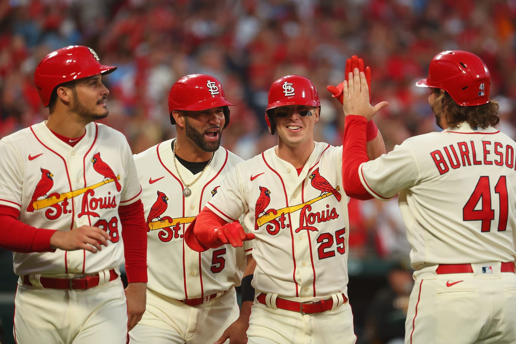 ST LOUIS, MO - OCTOBER 01: Nolan Arenado #28, Albert Pujols #5 and Corey Dickerson #25 all of the St. Louis Cardinals celebrate after Dickerson hit a grand slam against the Pittsburgh Pirates in the first inning at Busch Stadium on October 1, 2022 in St Louis, Missouri. (Photo by Dilip Vishwanat/Getty Images)