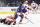 ELMONT, NEW YORK - OCTOBER 02: Mathew Barzal #13 of the New York Islanders carries the puck past Olle Lycksell #62 of the Philadelphia Flyers during the first period at the UBS Arena on October 02, 2022 in Elmont, New York. (Photo by Bruce Bennett/Getty Images)