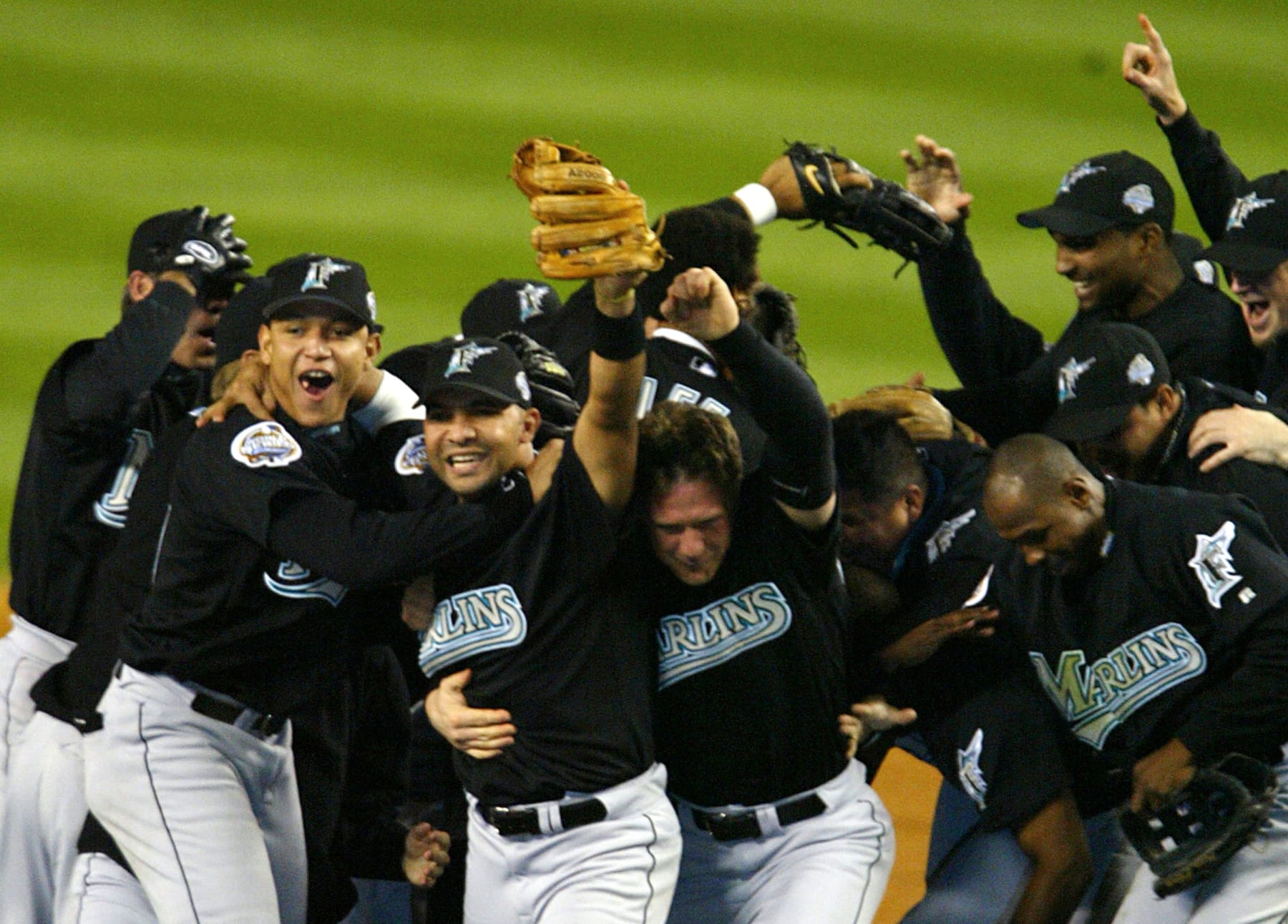 Bronx, NY - OCTOBER 25: The Florida Marlins celebrate their 2-0 win over the New York Yankees in Game Six of the World League Baseball Championship on October 25, 2003 at Yankee Stadium in the Bronx, New York. (Photo by Doug Bensinger/Getty Images)