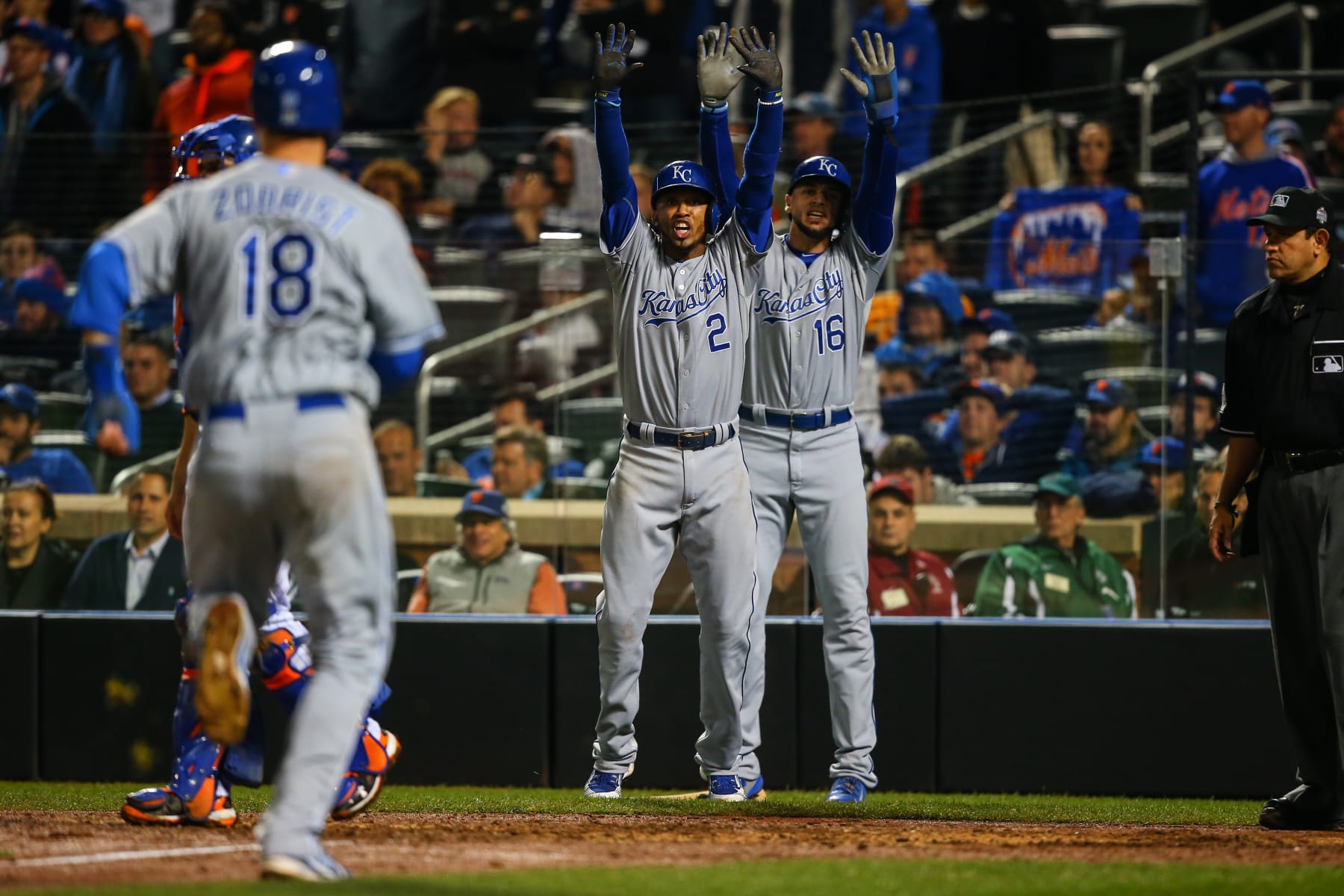 November 01, 2015: Kansas City Royals short stop Alcides Escobar (2) and right-back Paulo Orlando Kansas City Royals (16) wait for Kansas City Royals second Ben Zobrist (18) to score during Game 5 of the 2015 World Championship between the New York Mets and Kansas City Royals playing At Citi Field in Flushing, New York. (Photo by Rich Grisley/Aicon Sportswire) (Photo by Rich Grisley/Aicon Sportswire/Corbis/Aikon Sportswire via Getty Images)