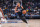 MEMPHIS, TN - OCTOBER 3: Jalen Suggs #4 of the Orlando Magic drives to the basket against the Memphis Grizzlies during a preseason game on October 3, 2022 at FedExForum in Memphis, Tennessee. NOTE TO USER: User expressly acknowledges and agrees that, by downloading and or using this photograph, User is consenting to the terms and conditions of the Getty Images License Agreement. Mandatory Copyright Notice: Copyright 2022 NBAE (Photo by Jesse D. Garrabrant/NBAE via Getty Images)