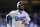 Los Angeles Dodgers' Cody Bellinger runs around first base against the Colorado Rockies during a baseball game Wednesday, Oct. 5, 2022, in Los Angeles. (AP Photo/Marcio Jose Sanchez)