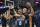 CHICAGO, ILLINOIS - FEBRUARY 05: Bronny James #0 and Amari Bailey #10 of Sierra Canyon HS celebrate after defeating Glenbard West HS at Wintrust Arena on February 05, 2022 in Chicago, Illinois. (Photo by Quinn Harris/Getty Images)