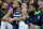 LAS VEGAS, NEVADA - OCTOBER 06: Rudy Gobert #27 and D'Angelo Russell #0 of the Minnesota Timberwolves talk on the bench in the first quarter of their preseason game against the Los Angeles Lakers at T-Mobile Arena on October 06, 2022 in Las Vegas, Nevada. The Timberwolves defeated the Lakers 114-99. NOTE TO USER: User expressly acknowledges and agrees that, by downloading and or using this photograph, User is consenting to the terms and conditions of the Getty Images License Agreement. (Photo by Ethan Miller/Getty Images)