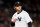 NEW YORK, NEW YORK - SEPTEMBER 23:  Gerrit Cole #45 of the New York Yankees heads into the dugout in the third inning against the Boston Red Sox at Yankee Stadium on September 23, 2022 in the Bronx borough of New York City. (Photo by Elsa/Getty Images)