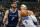 Orlando Magic's Paolo Banchero (5) looks for a shot against Memphis Grizzlies' Santi Aldama (7) during the first half of an NBA preseason basketball game Tuesday, Oct. 11, 2022, in Orlando, Fla. (AP Photo/John Raoux)