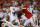 KANSAS CITY, MISSOURI - OCTOBER 10:  Derek Carr #4 of the Las Vegas Raiders is sacked by Chris Jones #95 of the Kansas City Chiefs during the 2nd quarter of the game at Arrowhead Stadium on October 10, 2022 in Kansas City, Missouri. Jones was called for a penalty for roughing the passer. (Photo by David Eulitt/Getty Images)