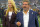 ARLINGTON, TX - OCTOBER 2: Washington Commanders owners Tanya Snyder, left, and Dan Snyder on the field before the Dallas Cowboys defeat of the Washington Commanders 25-10 at AT&T Stadium on October 2, 2022 in Arlington, TX. (Photo by John McDonnell/The Washington Post via Getty Images)