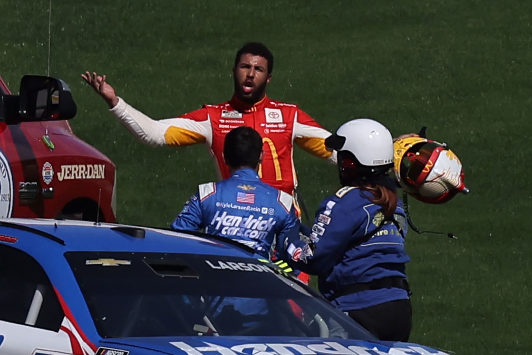 LAS VEGAS, NEVADA - OCTOBER 16: Bubba Wallace, driver of the #45 McDonald's Toyota, confronts Kyle Larson, driver of the #5 HendrickCars.com Chevrolet, after an on-track incident during the NASCAR Cup Series South Point 400 at Las Vegas Motor Speedway on October 16, 2022 in Las Vegas, Nevada. (Photo by Jonathan Bachman/Getty Images)