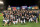 NEW YORK, NEW YORK - OCTOBER 18: The New York Yankees pose for a photo after defeating the Cleveland Guardians in game five of the American League Division Series at Yankee Stadium on October 18, 2022 in New York, New York. (Photo by Elsa/Getty Images)