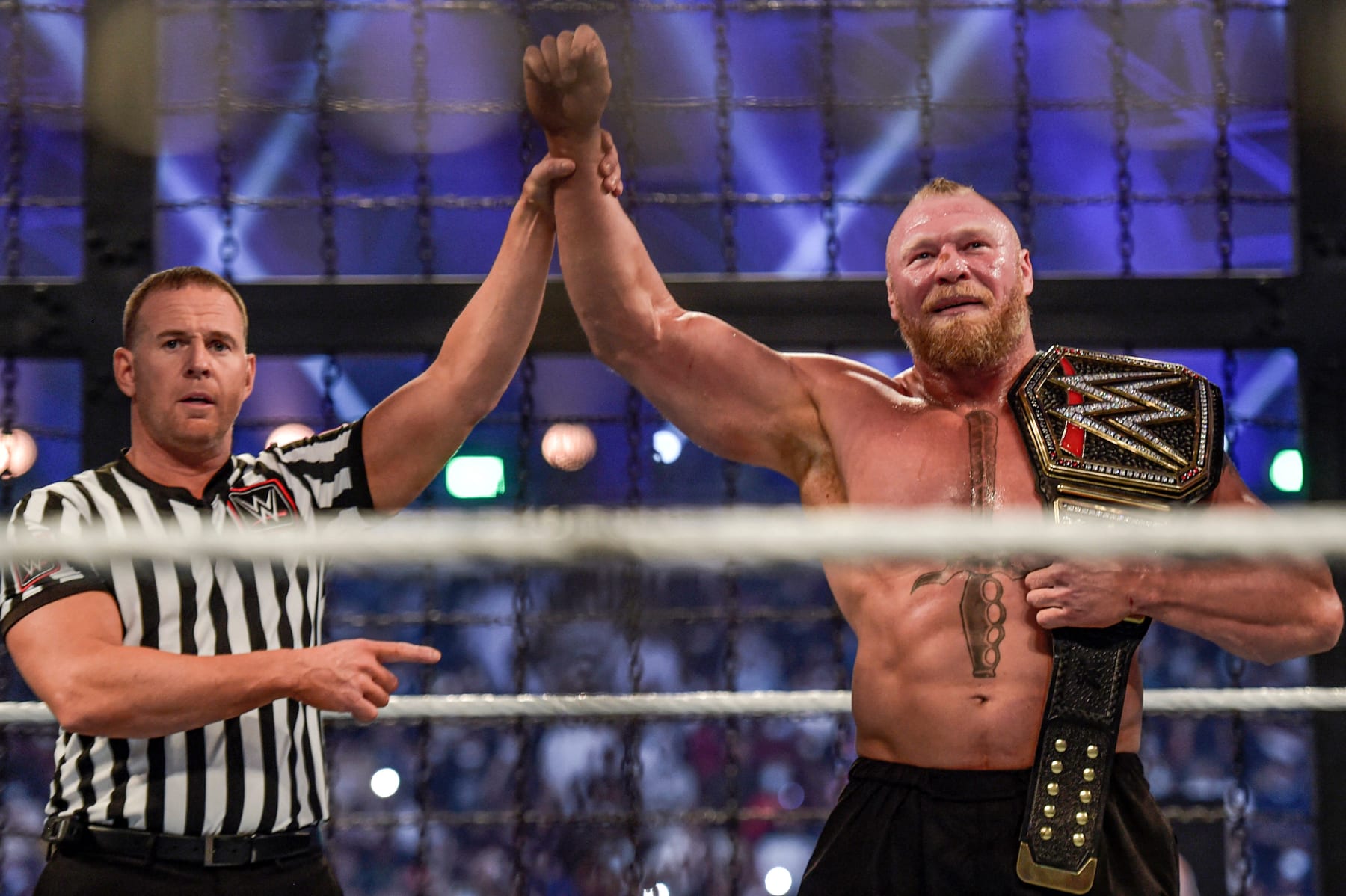 Why Brock Lesnar Will Not Be a WWE Universal Champion Again | News, Scores, Highlights, Stats, and Rumors 1 Brock Lesnar (R) is declared champion after the 2022 World Wrestling Entertainment (WWE) Elimination Chamber at the Jeddah Super Dome in the Saudi Arabian Red Sea coastal city of Jeddah on February 19, 2022. (Photo by Amer HILABI / AFP) (Photo by AMER HILABI/AFP via Getty Images)