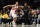 NEW YORK, NEW YORK - OCTOBER 21: Kevin Durant #7 of the Brooklyn Nets dribbles as Scottie Barnes #4 of the Toronto Raptors defends during the first half at Barclays Center on October 21, 2022 in the Brooklyn borough of New York City. NOTE TO USER: User expressly acknowledges and agrees that, by downloading and or using this photograph, User is consenting to the terms and conditions of the Getty Images License Agreement. (Photo by Sarah Stier/Getty Images)