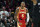 Atlanta Hawks guard Dejounte Murray reacts after a basket against the Houston Rockets during the second half of an NBA basketball game Wednesday, Oct. 19, 2022, in Atlanta. (AP Photo/John Bazemore)