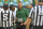 MIAMI GARDENS, FL - OCTOBER 08:  Miami head coach Mario Cristobal speaks with officials while trainers tend to an injured player in the second quarter as the University of Miami Hurricanes faced the University of North Carolina at Chapel Hill Tar Heels on October 8, 2022, at Hard Rock Stadium in Miami Gardens, Florida. (Photo by Samuel Lewis/Icon Sportswire via Getty Images)