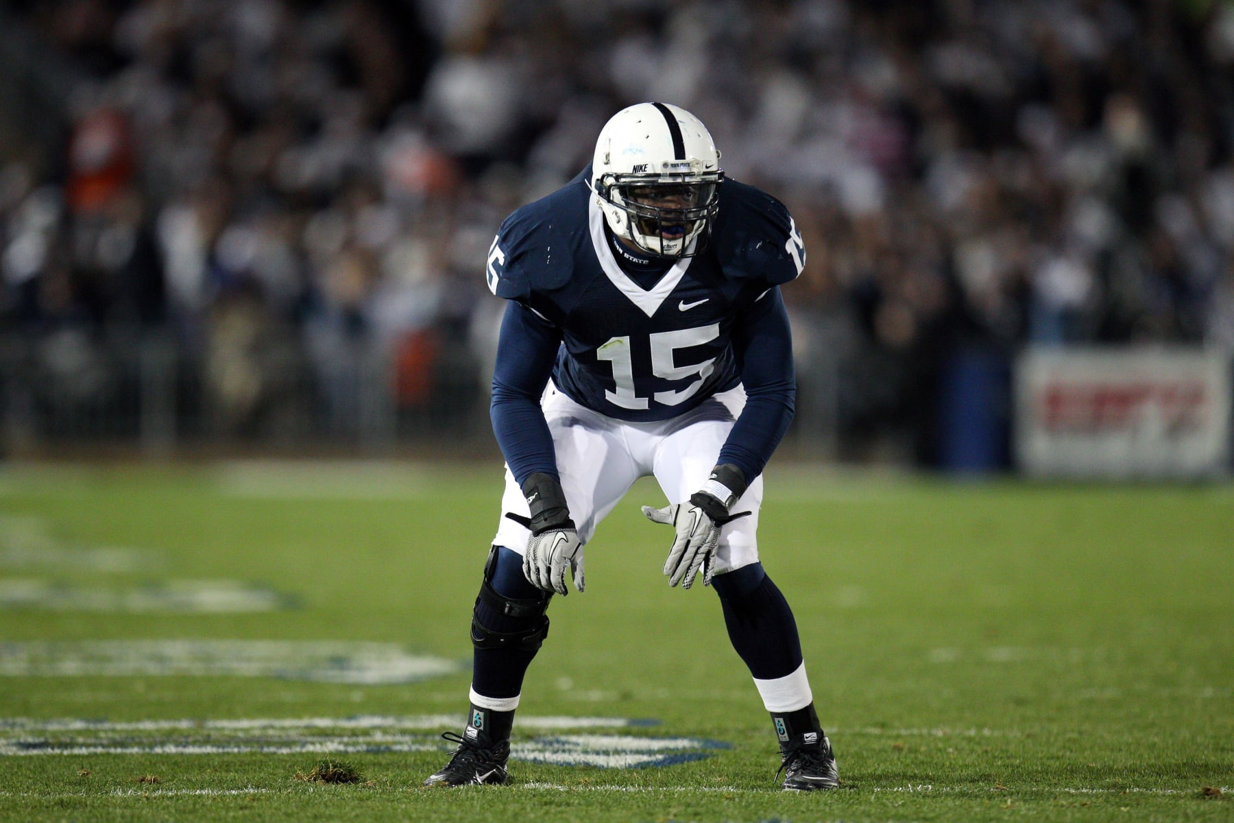 STATE COLLEGE, PA - OCTOBER 30: Linebacker Bani Gbadyu #15 of the Penn State Nittany Lions defends against the University of Michigan Wolverines at Beaver Stadium on October 30, 2010 in State College, Pennsylvania. Penn State won 41-31. (Photo by Ned Dishman/Getty Images)