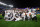 NEW YORK, NEW YORK - OCTOBER 23: The Houston Astros pose for a team photo after defeating the New York Yankees in game four to win the American League Championship Series at Yankee Stadium on October 23, 2022 in the Bronx borough of New York City. (Photo by Elsa/Getty Images)