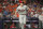 Philadelphia Phillies' J.T. Realmuto watches his solo homer during the 10th inning in Game 1 of baseball's World Series between the Houston Astros and the Philadelphia Phillies on Friday, Oct. 28, 2022, in Houston. (AP Photo/David J. Phillip)