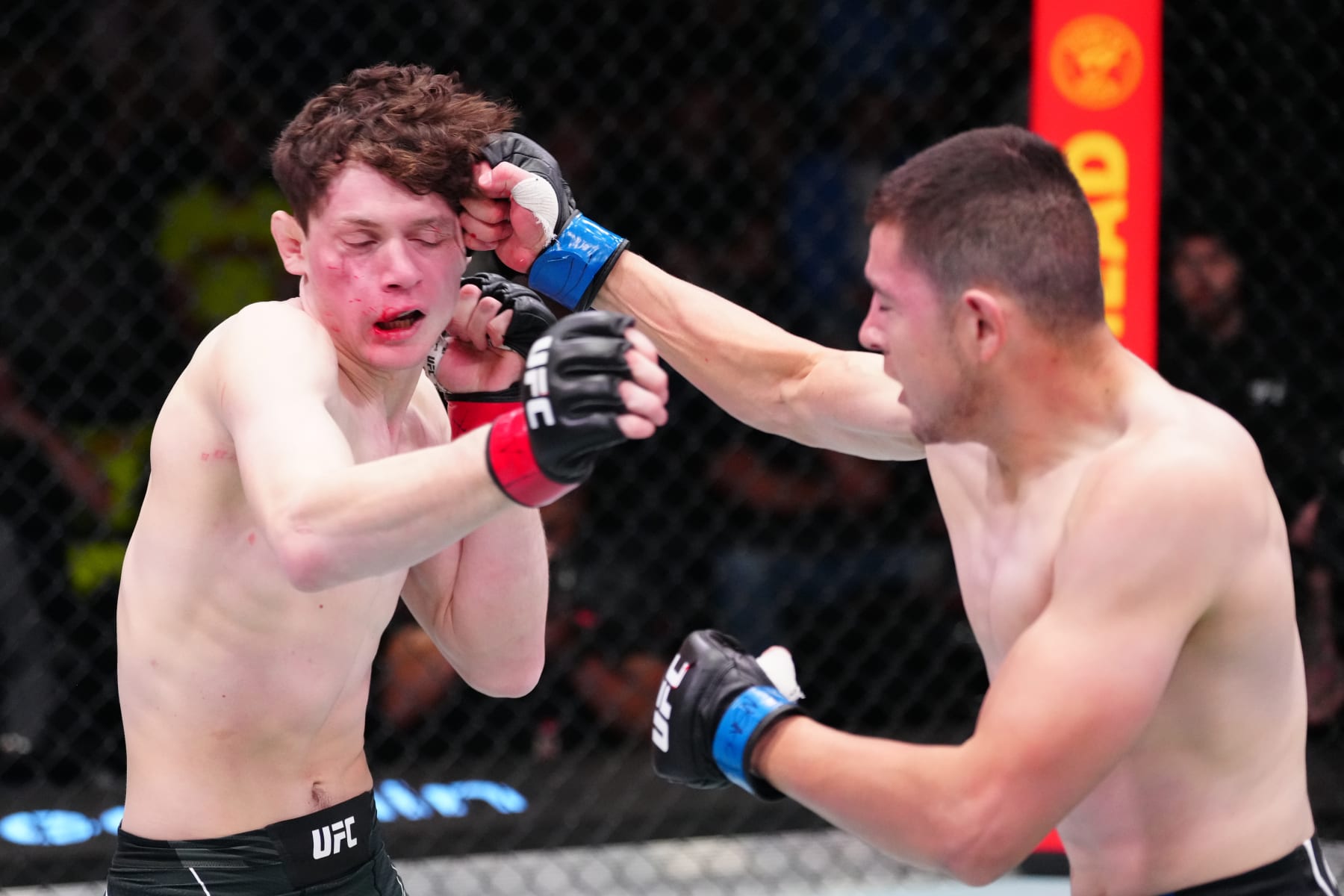Steve Garcia hits Chase Hooper.