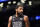 Brooklyn Nets guard Kyrie Irving looks out during the first half of an NBA basketball game against the Indiana Pacers Monday, Oct. 31, 2022, in New York. (AP Photo/Jessie Alcheh)