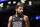 Brooklyn Nets guard Kyrie Irving looks on during the first half of an NBA basketball game against the Indiana Pacers, Monday, Oct. 31, 2022, in New York. (AP Photo/Jessie Alcheh)