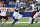 Indianapolis Colts running back Jonathan Taylor (28) runs up the middle during an NFL football game against the Washington Commanders, Sunday, Oct. 30, 2022, in Indianapolis. (AP Photo/Zach Bolinger)