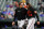 Baltimore Orioles catcher Adley Rutschman, left, and pitcher DL Hall talk after pitching to the Toronto Blue Jays during the eighth inning of the first game of a baseball doubleheader, Wednesday, Oct. 5, 2022, in Baltimore. The Orioles won 5-4. (AP Photo/Julio Cortez)