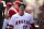 Los Angeles Angels designated hitter Shohei Ohtani (17) walks in the dugout during the first inning of a baseball game against the Texas Rangers in Anaheim, Calif., Sunday, Oct. 2, 2022. (AP Photo/Ashley Landis)