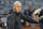 New York Yankees general manager Brian Cashman attends batting practice during a workout ahead of Game 1 of baseball's American League Division Series against the Cleveland Guardians, Monday, Oct. 10, 2022, in New York. (AP Photo/John Minchillo)