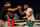 Floyd Mayweather works the mitts ahead of the exhibition bout.