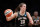 New York Liberty guard Sabrina Ionescu (20) dribbles the ball against the Chicago Sky during the first half of a WNBA basketball playoff game Tuesday, Aug. 23, 2022, in New York. (AP Photo/Noah K. Murray)