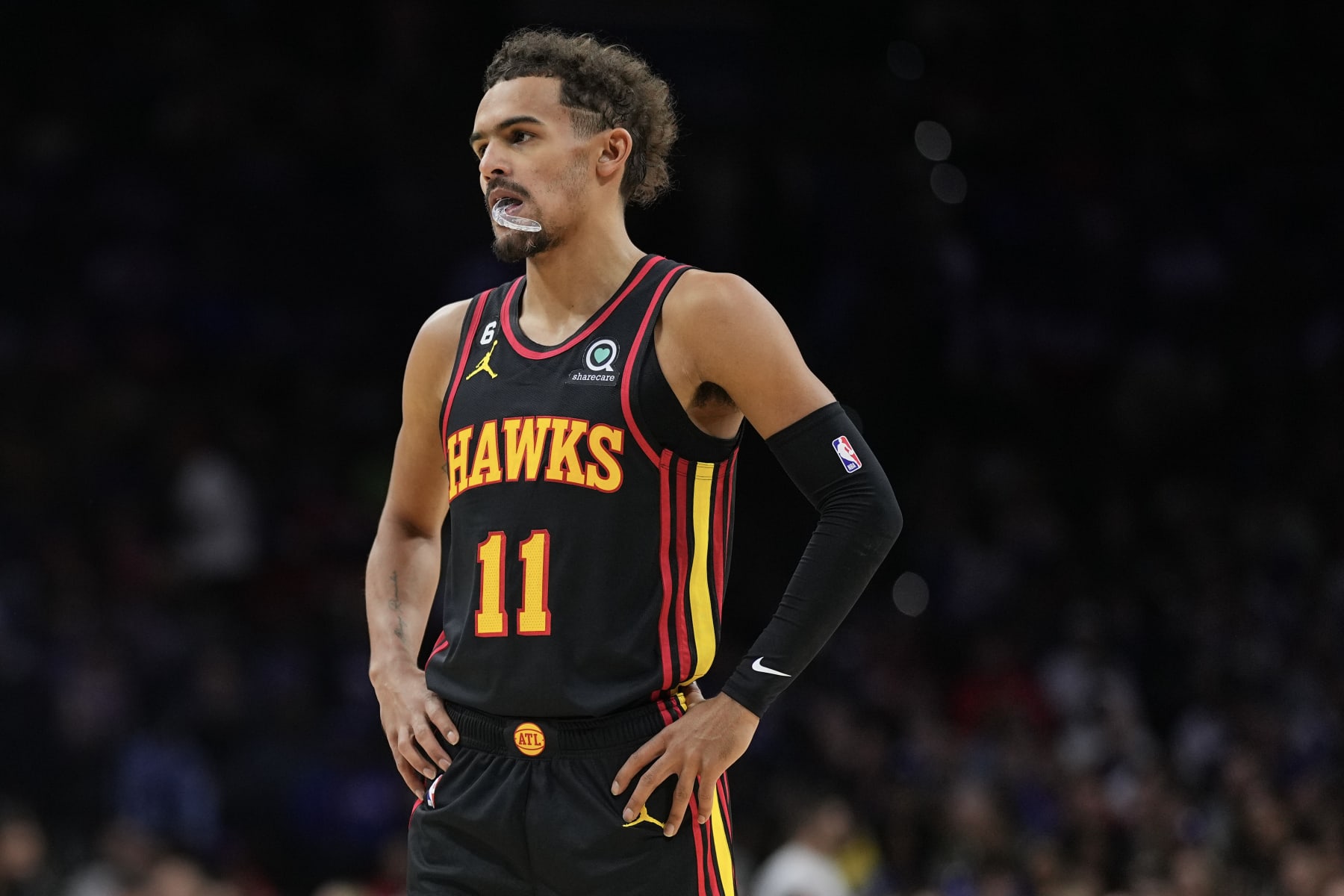 PHILADELPHIA, PA - NOVEMBER 12: Trae Young #11 of the Atlanta Hawks looks on against the Philadelphia 76ers at the Wells Fargo Center on November 12, 2022 in Philadelphia, Pennsylvania. NOTE TO USER: User expressly acknowledges and agrees that, by downloading and or using this photograph, User is consenting to the terms and conditions of the Getty Images License Agreement. (Photo by Mitchell Leff/Getty Images)