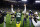 Green Bay Packers quarterback Aaron Rodgers (12) celebrates as he walks off the field following the team's 31-28 overtime win in an NFL football game against the Dallas Cowboys Sunday, Nov. 13, 2022, in Green Bay, Wis. (AP Photo/Matt Ludtke)