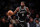 NEW YORK, NEW YORK - NOVEMBER 01: Kyrie Irving #11 of the Brooklyn Nets brings the ball up the court during the fourth quarter of the game against the Chicago Bulls at Barclays Center on November 01, 2022 in New York City. NOTE TO USER: User expressly acknowledges and agrees that, by downloading and or using this photograph, User is consenting to the terms and conditions of the Getty Images License Agreement. (Photo by Dustin Satloff/Getty Images)
