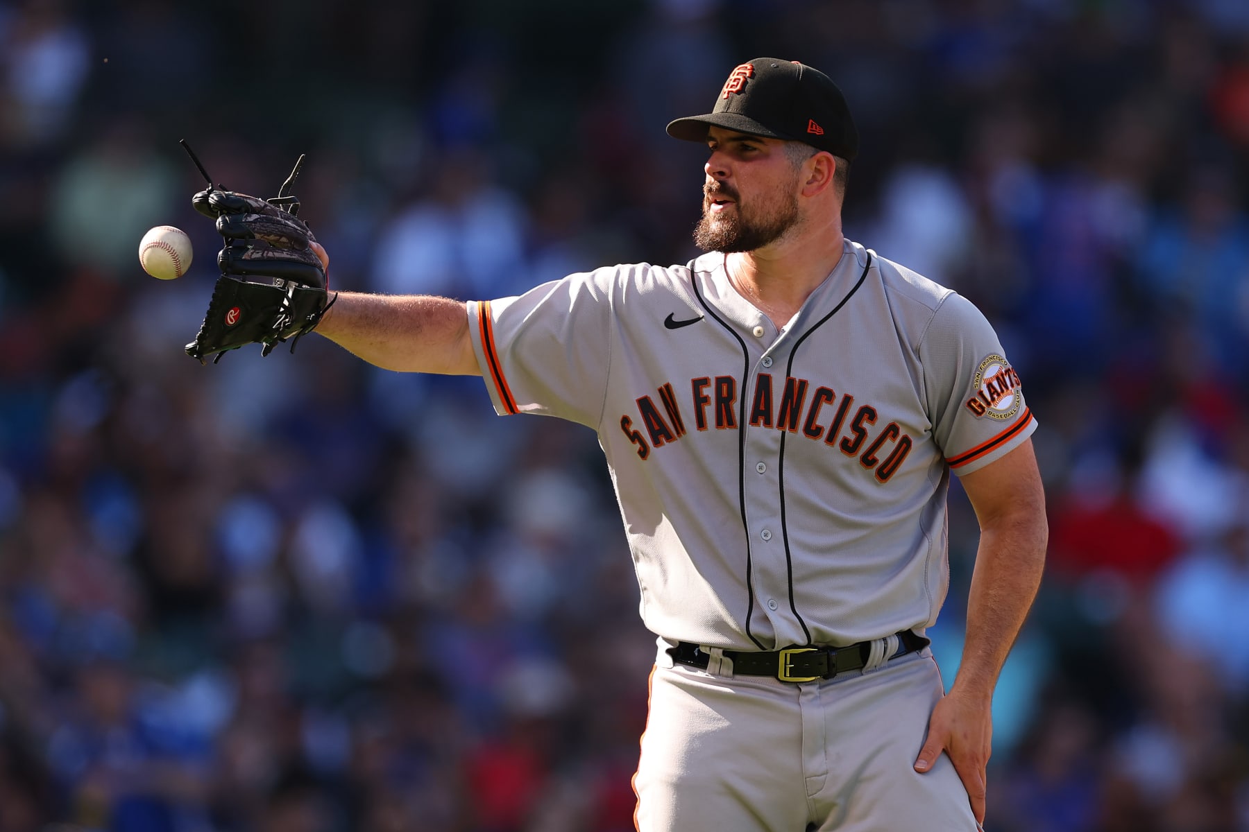 CHICAGO, ILLINOIS - SEPTEMBER 09: Carlos Rodon #16 of the San Francisco Giants reacts against the Chicago Cubs at Wrigley Field on September 09, 2022 in Chicago, Illinois. (Photo by Michael Reaves/Getty Images)