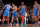 NEW YORK, NY - NOVEMBER 13: Shai Gilgeous-Alexander #2 of the Oklahoma City Thunder shakes teammates hands against the New York Knicks on November 13, 2022 at Madison Square Garden in New York City, New York.  NOTE TO USER: User expressly acknowledges and agrees that, by downloading and or using this photograph, User is consenting to the terms and conditions of the Getty Images License Agreement. Mandatory Copyright Notice: Copyright 2022 NBAE  (Photo by Nathaniel S. Butler/NBAE via Getty Images)
