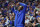 LEXINGTON, KENTUCKY - NOVEMBER 11:  Oscar Tshiebwe #34 of the Kentucky Wildcats cheers from the bench during the game against the Duquesne Dukes at Rupp Arena on November 11, 2022 in Lexington, Kentucky. (Photo by Andy Lyons/Getty Images)