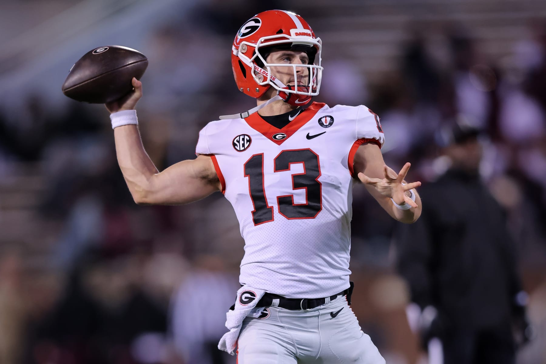 STARKVILLE, MISSISSIPPI - NOVEMBER 12: Stetson Bennett #13 of the Georgia Bulldogs warms up before a game against the Mississippi State Bulldogs at Davis Wade Stadium on November 12, 2022 in Starkville, Mississippi. (Photo by Jonathan Bachman/Getty Images)