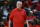 Washington Mystics head coach Mike Thibault looks on from the sideline during the first half of a WNBA basketball game against the Indiana Fever, Friday, May 6, 2022, in Washington. (AP Photo/Terrance Williams)
