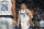 Dallas Mavericks guard Luka Doncic (77) laughs on the floor during the first half of an NBA basketball game against the Los Angeles Clippers in Dallas on Tuesday, Nov. 15, 2022. (AP Photo/LM Other)