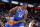INDIANAPOLIS, INDIANA - NOVEMBER 15: Oscar Tshiebwe #34 of the Kentucky Wildcats takes control of the ball during the first half in the game against the Michigan State Spartans during the Champions Classic at Gainbridge Fieldhouse on November 15, 2022 in Indianapolis, Indiana. (Photo by Andy Lyons/Getty Images)