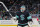 SEATTLE, WASHINGTON - NOVEMBER 11: Martin Jones #30 of the Seattle Kraken skates away from the crease during a second period timeout in a game against the Minnesota Wild at Climate Pledge Arena on November 11, 2022 in Seattle, Washington. (Photo by Christopher Mast/NHLI via Getty Images)