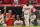 ANAHEIM, CA - SEPTEMBER 16: Matt Duffy #5 , interim manager Phil Nevin #88, Kurt Suzuki #24 and Jo Adell #7 of the Los Angeles Angels wait to greet Mike Trout #27 after a solo home run in the game against the Seattle Mariners at Angel Stadium of Anaheim on September 16, 2022 in Anaheim, California. (Photo by Jayne Kamin-Oncea/Getty Images)