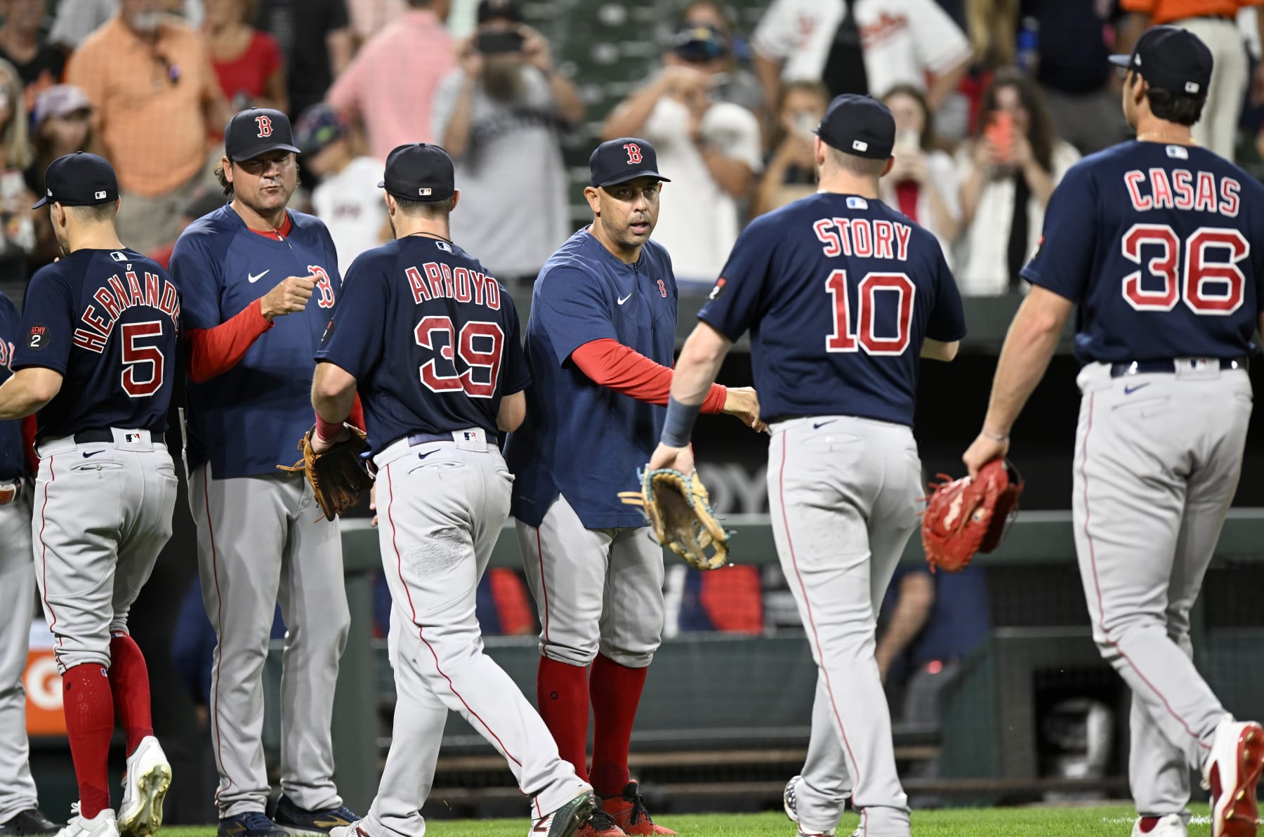 BALTIMORE, MARYLAND - SEPTEMBER 10: Manager Alex Cora #13 of the Boston Red Sox celebrates with his team after a 17-4 victory against the Baltimore Orioles at Oriole Park at Camden Yards on September 10, 2022 in Baltimore, Maryland. (Photo by Greg Fiume/Getty Images)