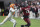 South Carolina wide receiver Jalen Brooks (13) makes a catch next to Tennessee defensive back Brandon Turnage (8) during the first half of an NCAA college football game Saturday, Nov. 19, 2022, in Columbia, S.C. (AP Photo/Artie Walker Jr.)