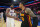 PHILADELPHIA, PA - NOVEMBER 12: Joel Embiid #21 of the Philadelphia 76ers hugs John Collins #20 of the Atlanta Hawks after the game on November 12, 2022 at the Wells Fargo Center in Philadelphia, Pennsylvania NOTE TO USER: User expressly acknowledges and agrees that, by downloading and/or using this Photograph, user is consenting to the terms and conditions of the Getty Images License Agreement. Mandatory Copyright Notice: Copyright 2022 NBAE (Photo by Jesse D. Garrabrant/NBAE via Getty Images)
