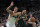 Boston Celtics forward Jayson Tatum (0) drives past Dallas Mavericks center Dwight Powell (7) during the first half of an NBA basketball game, Wednesday, Nov. 23, 2022, in Boston. (AP Photo/Mary Schwalm)